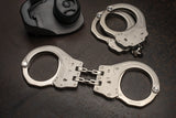 ASP - Handschelle Sentry mit Gelenk aus Stahl